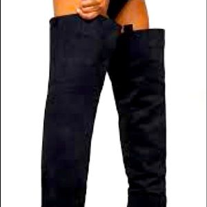 Express black suede over the knee heeled boots.